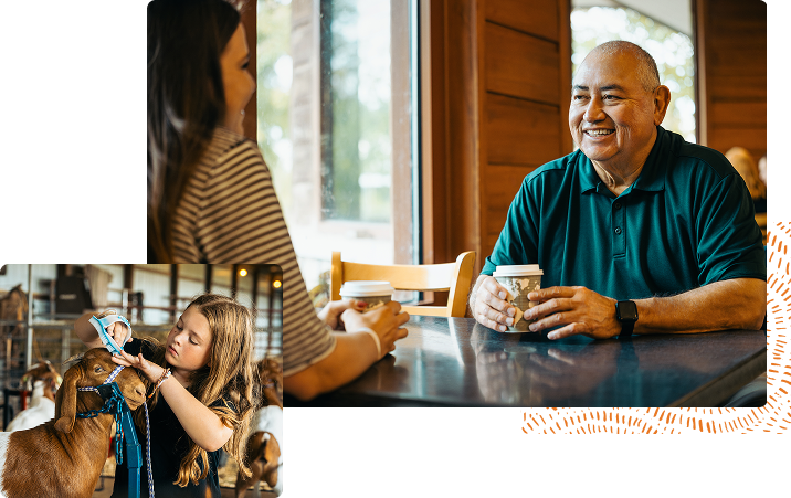 smiling middle-age man in conversation with friend at coffee shop