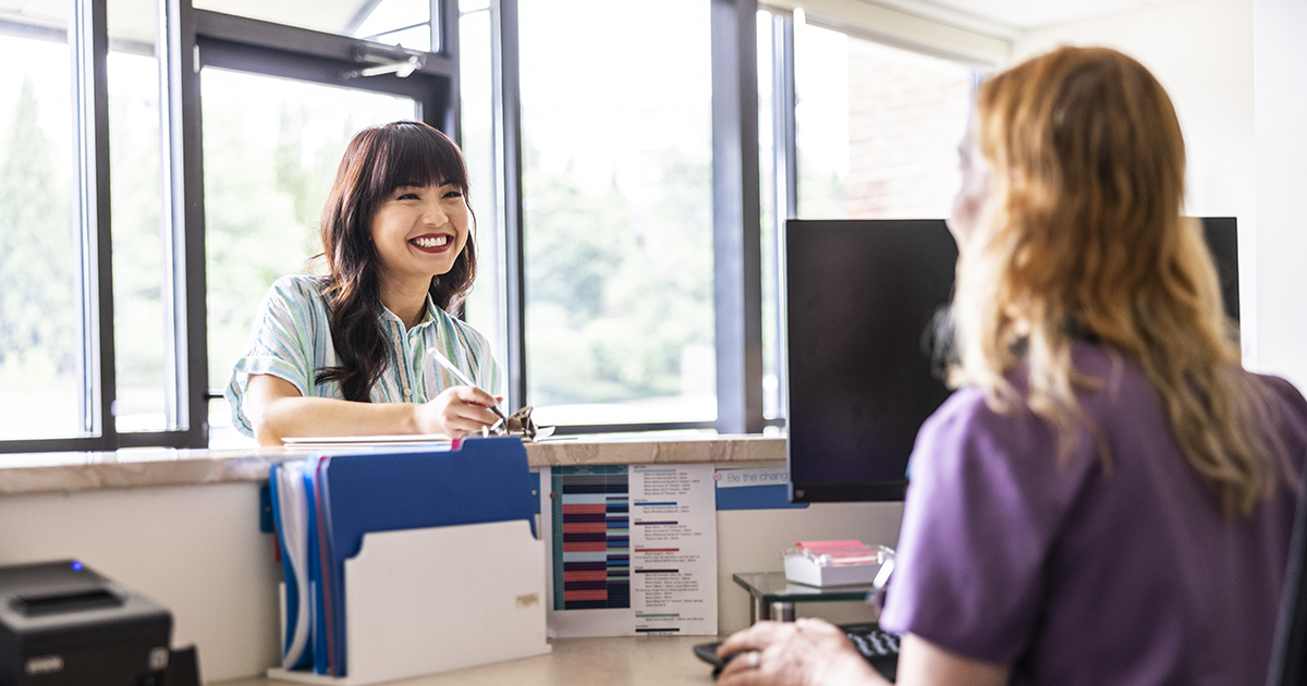 A woman filling out a form