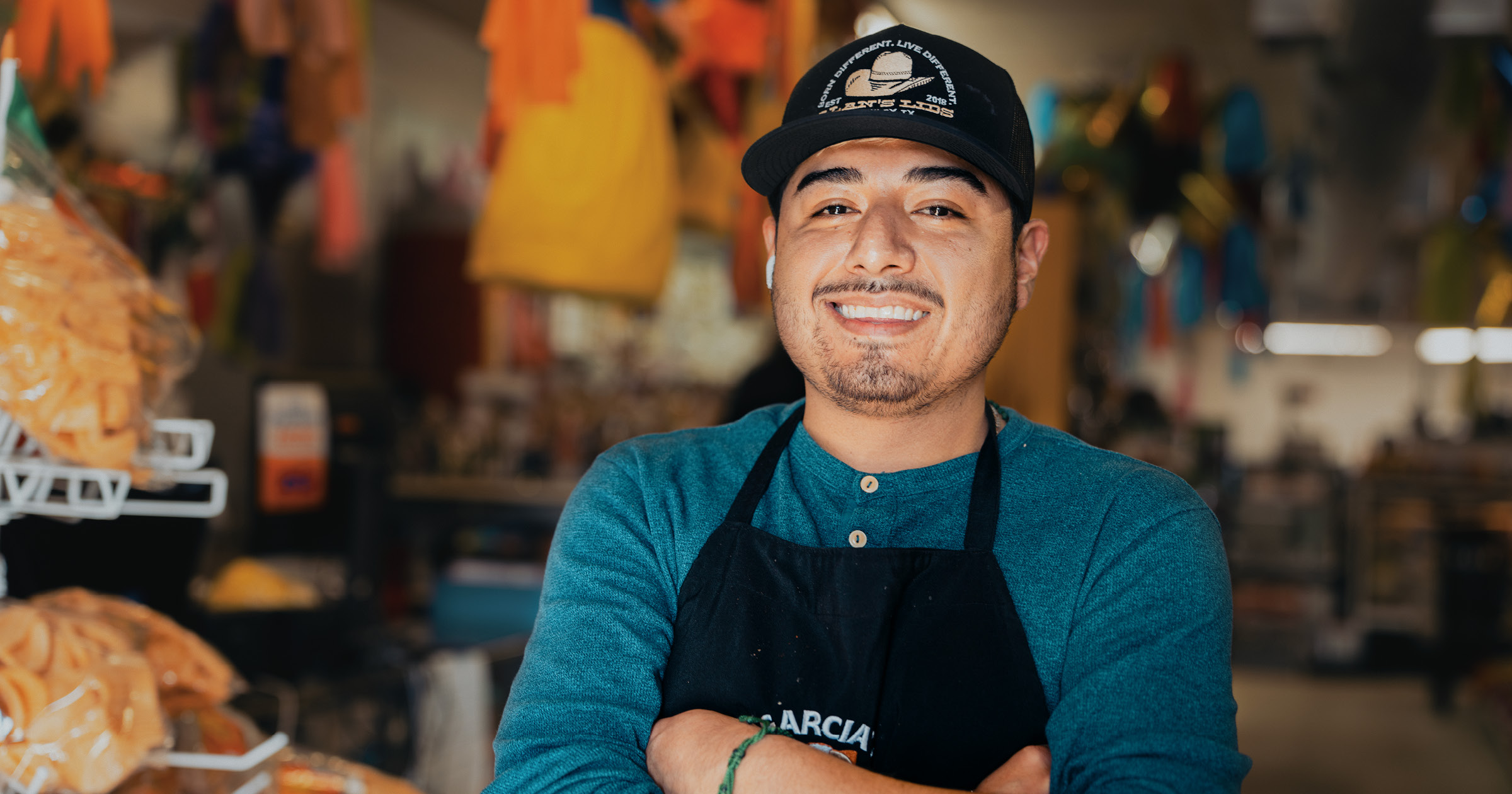 a worker posing proudly