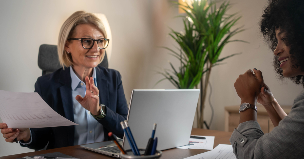 two business people at a desk